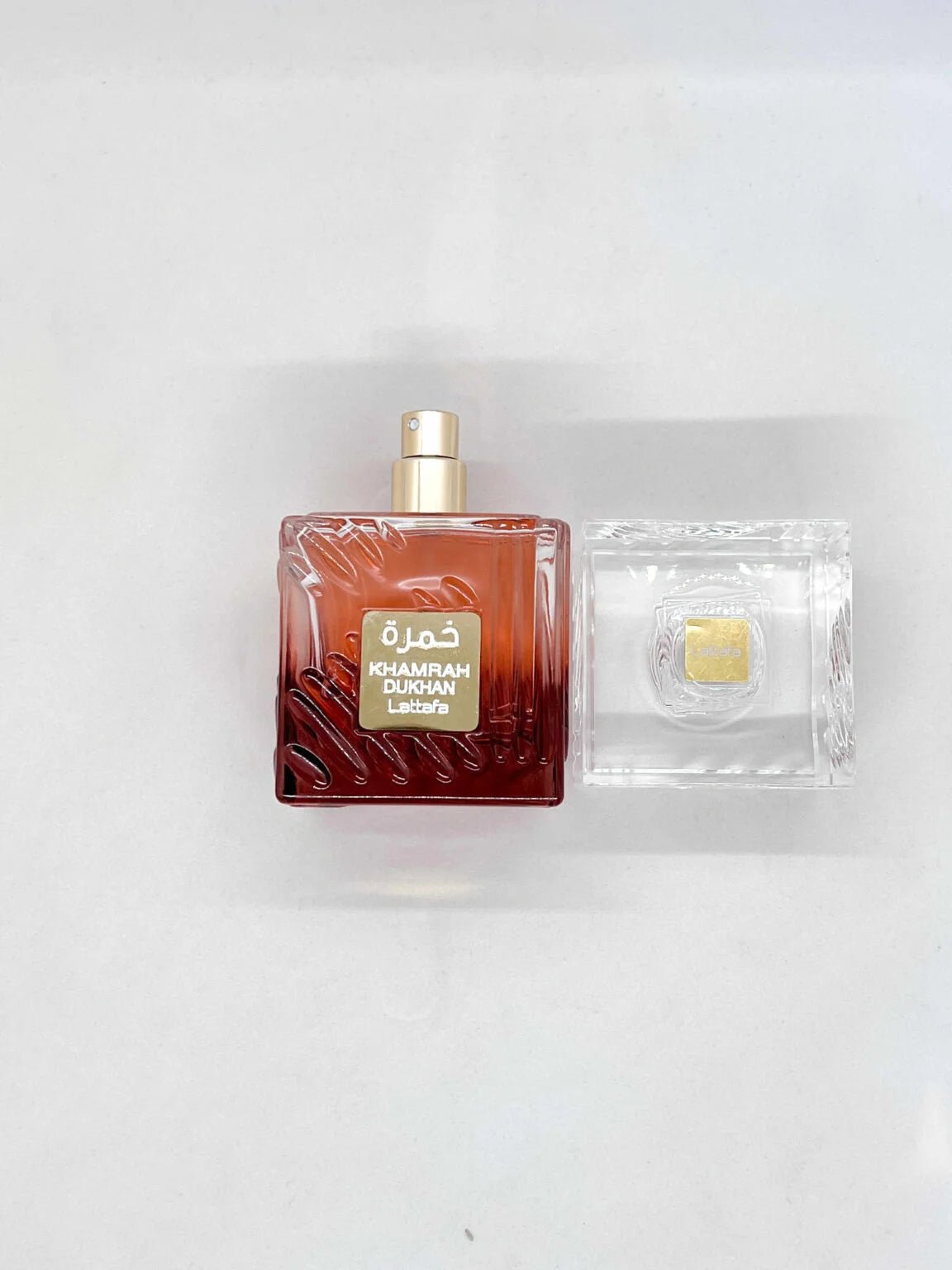 Khamrah Dukhan Lattafa Perfumes للرجال - Flowry